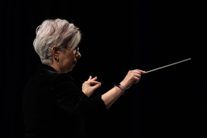 Emily Gurwitz directing/clinicing a concert band